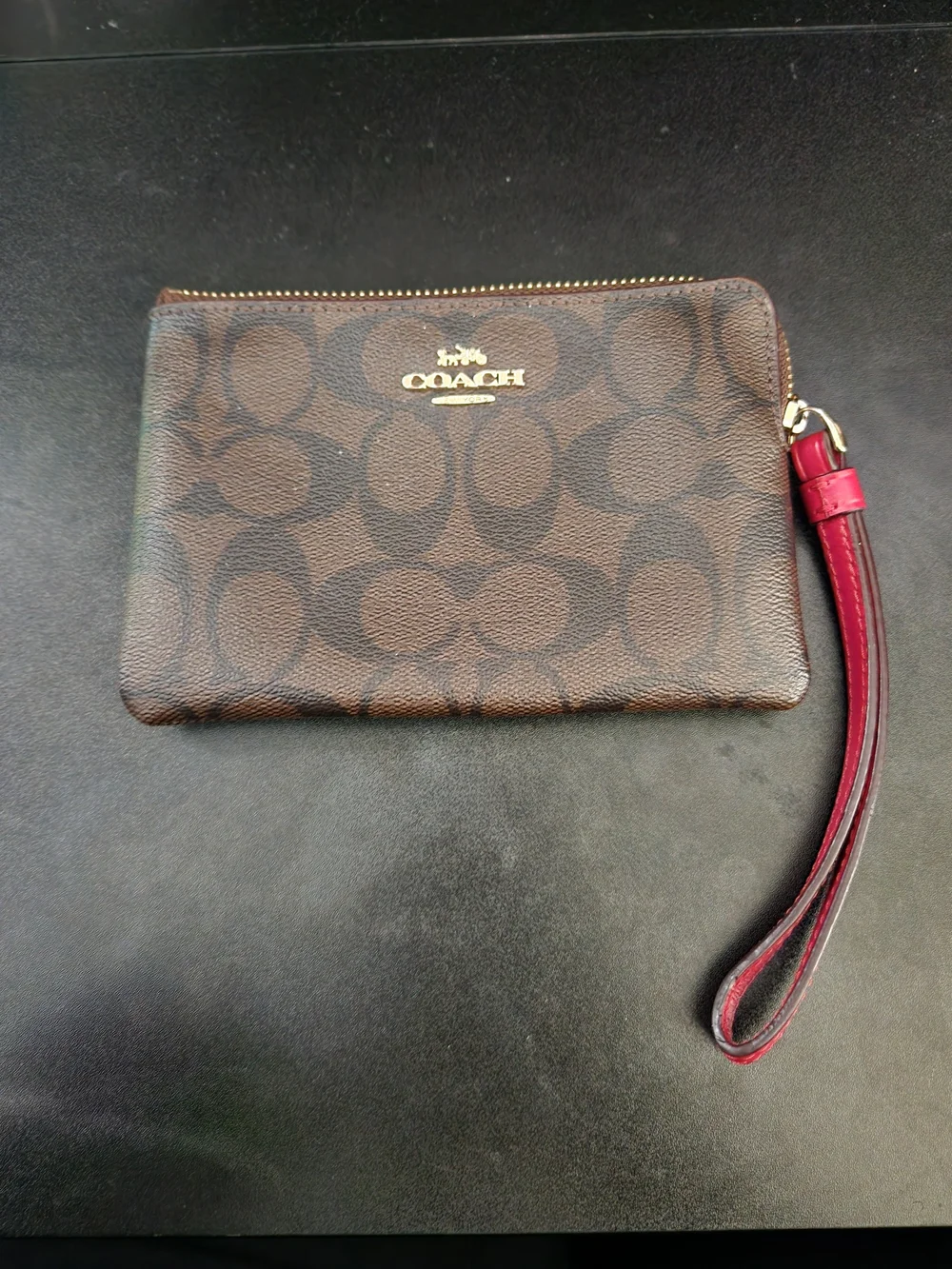 Coach Brown Monogram Wristlet with Red Strap